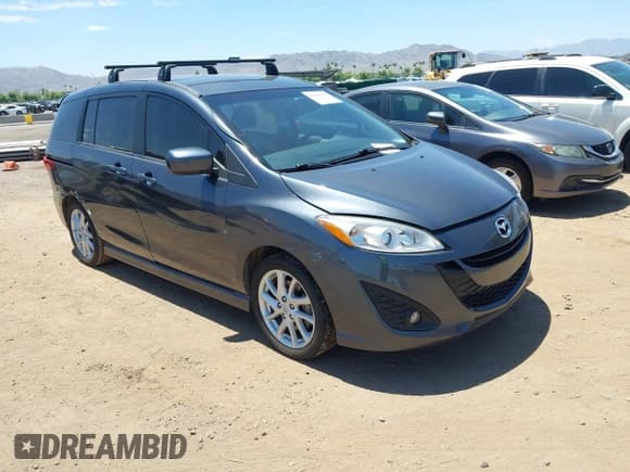 ✅ 2012 Mazda 5 Touring • VIN: JM1CW2CL9C0136919 • Lot: 42605103. Listed on IAAI with 119,656 mi. Free auction sales archive from the USA and detailed vehicle history report at DreamBid. Image 1.