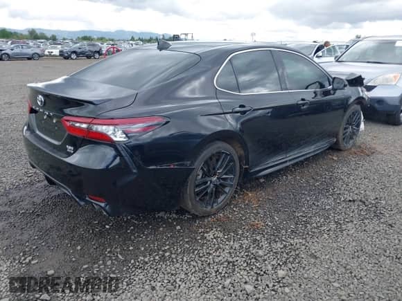 2022 Toyota Camry XSE with VIN 4T1K61BK6NU068584, listed as a IAAI auction lot 42248113 with 59,503 mi miles and . Bid and sale history available at DreamBid. Image 4.