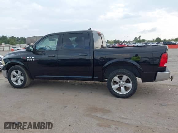 2014 Ram 1500 Big Horn with VIN 1C6RR7LM5ES385563, listed as a IAAI auction lot 43540358 with 184,258 mi miles and . Bid and sale history available at DreamBid. Image 14.
