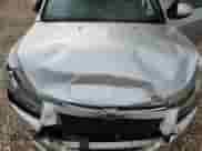 2014 Chevrolet Cruze 2LT z VIN 1G1PE5SB1E7387743, wystawiony jako Copart lot #82086345 z przebiegiem 82 252 mil mil oraz Szkoda całkowita • Salvage title. Historia ofert i sprzedaży dostępna na DreamBid. Obrazek 11.