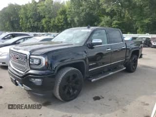 ✅ 2018 GMC Sierra 1500 Denali • VIN: 3GTU2PECXJG521358 • Лот: 70265395. Опубликован ранее на Copart с пробегом 99 289 миль. Бесплатный доступ к архиву аукционных продаж из США и подробный отчёт об истории автомобиля на DreamBid. Изображение 1.