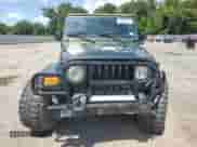 2005 Jeep Wrangler X с VIN 1J4FA39S45P319326, выставлен на аукционе Copart как лот 64983495 с пробегом 156 551 миль миль и Списание • Salvage title. История ставок и продаж доступна на DreamBid. Изображение 5.