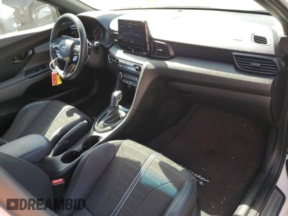 2022 Hyundai Veloster z VIN KMHT36AH5NU012944, wystawiony jako Copart lot #73705614 z przebiegiem 18 031 mil mil oraz Szkoda całkowita • Salvage title. Historia ofert i sprzedaży dostępna na DreamBid. Obrazek 8.