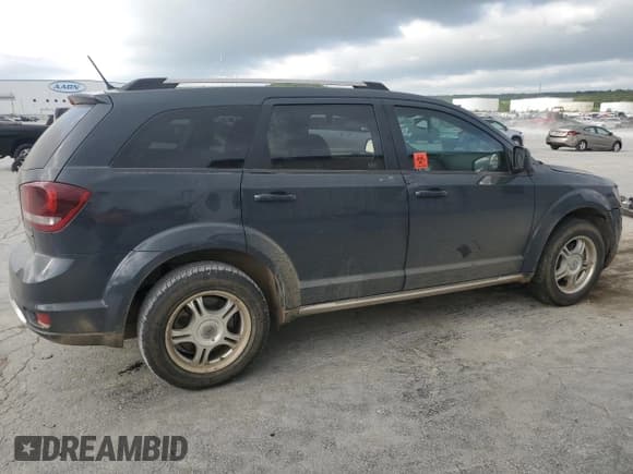 ✅ 2017 Dodge Journey Crossroad Plus • VIN: 3C4PDCGBXHT580528 • Lot: 52886895. Listed on Copart with 143,633 mi. Free auction sales archive from the USA and detailed vehicle history report at DreamBid. Image 3.