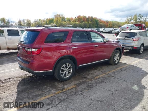 ✅ 2015 Dodge Durango Limited • VIN: 1C4RDJDG0FC120638 • Lot: 43526631. Listed on IAAI with 167,370 mi. Free auction sales archive from the USA and detailed vehicle history report at DreamBid. Image 4.