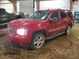 2013 Chevrolet Tahoe LTZ with VIN 1GNSKCE07DR373610, listed as a Copart auction lot 67510235 with 157,323 mi miles and Clean title. Bid and sale history available at DreamBid. Image 1.