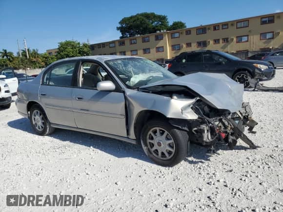 1997 Chevrolet Malibu LS z VIN 1G1NE52M0V6116879, wystawiony jako Copart lot #57306115 z przebiegiem Nie podano mil oraz Szkoda całkowita • Salvage title. Historia ofert i sprzedaży dostępna na DreamBid. Obrazek 4.