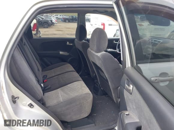 ✅ 2008 Kia Sportage LX • VIN: KNDJE723387474548 • Lot: 42855501. Wystawiony na IAAI z przebiegiem 185 800 mil. Bezpłatny archiwum sprzedaży aukcyjnych z USA i szczegółowy raport historii pojazdu na DreamBid. Zdjęcie 8.