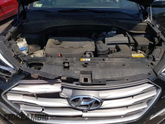 ✅ 2017 Hyundai Santa Fe 2.4L • VIN: 5XYZUDLB0HG458241 • Лот: 63053374. Опубликован ранее на Copart с пробегом Не указан. Бесплатный доступ к архиву аукционных продаж из США и подробный отчёт об истории автомобиля на DreamBid. Изображение 14.