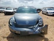 ✅ 2014 Volkswagen Beetle 2.0L TDI w/Sun/Sound/Nav • VIN: 3VWJL7AT2EM634232 • Лот: 64551775. Опубликован ранее на Copart с пробегом Не указан. Бесплатный доступ к архиву аукционных продаж из США и подробный отчёт об истории автомобиля на DreamBid. Изображение 5.