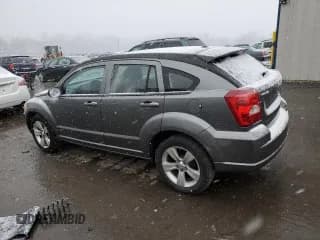 ✅ 2012 Dodge Caliber SXT • VIN: 1C3CDWDA3CD531153 • Лот: 82926094. Опубликован ранее на Copart с пробегом 184 746 миль. Бесплатный доступ к архиву аукционных продаж из США и подробный отчёт об истории автомобиля на DreamBid. Изображение 2.