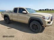 ✅ 2018 Toyota Tacoma SR5 • VIN: 5TFSZ5AN9JX141602 • Lot: 61573115. Listed on Copart with 102,677 mi. Free auction sales archive from the USA and detailed vehicle history report at DreamBid. Image 4.