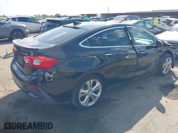✅ 2017 Chevrolet Cruze Premier • VIN: 1G1BF5SM7H7188189 • Lot: 43378840. Listed on IAAI with 126,909 mi. Free auction sales archive from the USA and detailed vehicle history report at DreamBid. Image 4.
