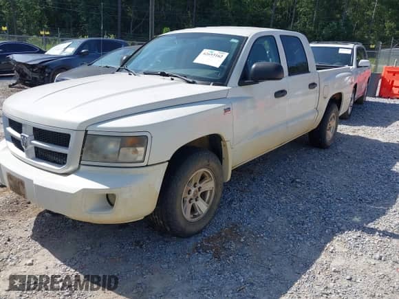 2009 Dodge Dakota z VIN 1D3HW38PX9S789626, wystawiony jako IAAI lot #42693162 z przebiegiem 175 620 mil mil oraz . Historia ofert i sprzedaży dostępna na DreamBid. Obrazek 6.