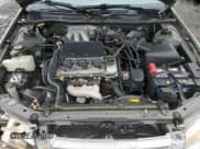 ✅ 1999 Toyota Camry LE • VIN: JT2BF22KXX0155823 • Lot: 92855365. Wystawiony na Copart z przebiegiem 142 365 mil. Bezpłatny archiwum sprzedaży aukcyjnych z USA i szczegółowy raport historii pojazdu na DreamBid. Zdjęcie 11.