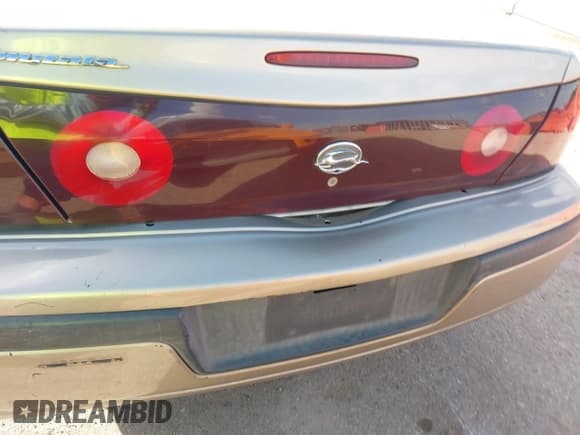 ✅ 2004 Chevrolet Impala • VIN: 2G1WF52E749129226 • Lot: 43694081. Listed on IAAI with 124,544 mi. Free auction sales archive from the USA and detailed vehicle history report at DreamBid. Image 14.