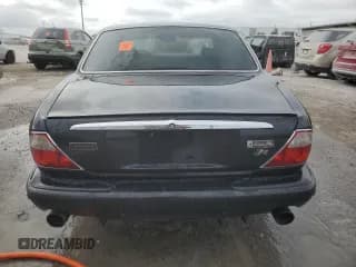 ✅ 2003 Jaguar XJ 8 • VIN: SAJDA14C93LF51026 • Лот: 83897794. Опубликован ранее на Copart с пробегом 50 945 миль. Бесплатный доступ к архиву аукционных продаж из США и подробный отчёт об истории автомобиля на DreamBid. Изображение 6.