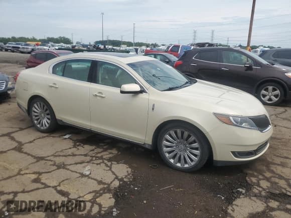 ✅ 2014 Lincoln MKS • VIN: 1LNHL9EK1EG611304 • Лот: 64012895. Опубликован ранее на Copart с пробегом 143 107 миль. Бесплатный доступ к архиву аукционных продаж из США и подробный отчёт об истории автомобиля на DreamBid. Изображение 4.