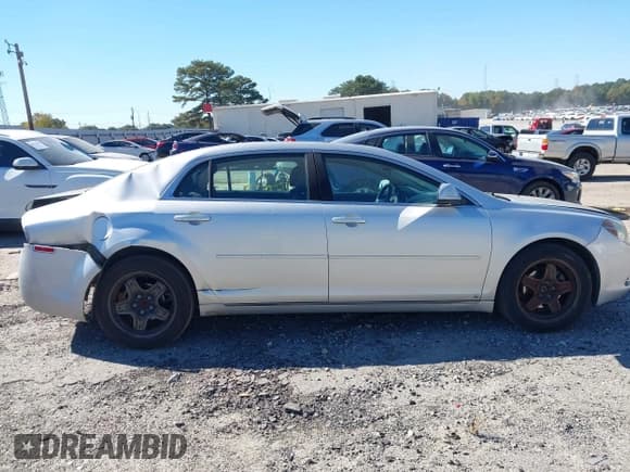 ✅ 2009 Chevrolet Malibu 1LT • VIN: 1G1ZH57B89F129482 • Lot: 43464716. Listed on IAAI with 214,485 mi. Free auction sales archive from the USA and detailed vehicle history report at DreamBid. Image 13.