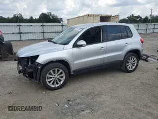 ✅ 2018 Volkswagen Tiguan • VIN: WVGAV7AX3JK002014 • Лот: 69226195. Опубликован ранее на Copart с пробегом 93 931 миль. Бесплатный доступ к архиву аукционных продаж из США и подробный отчёт об истории автомобиля на DreamBid. Изображение 1.