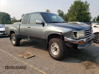 ✅ 1996 Toyota T100 SR5 • VIN: JT4UN24D3T0032313 • Лот: 70693914. Опубликован ранее на Copart с пробегом 210 021 миль. Бесплатный доступ к архиву аукционных продаж из США и подробный отчёт об истории автомобиля на DreamBid. Изображение 4.