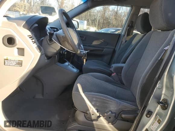 2006 Hyundai Tucson GLS z VIN KM8JN12D16U345952, wystawiony jako Copart lot #82710294 z przebiegiem 138 257 mil mil oraz Szkoda całkowita • Salvage title. Historia ofert i sprzedaży dostępna na DreamBid. Obrazek 7.