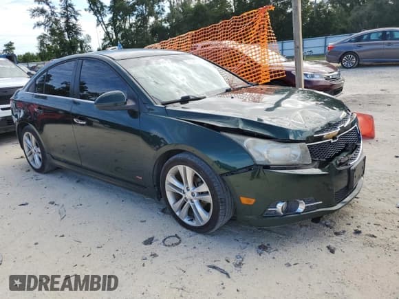 ✅ 2014 Chevrolet Cruze LTZ • VIN: 1G1PG5SB4E7166499 • Lot: 71042705. Listed on Copart with 197,470 mi. Free auction sales archive from the USA and detailed vehicle history report at DreamBid. Image 4.