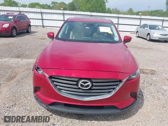 ✅ 2016 Mazda CX-9 Touring • VIN: JM3TCACY0G0101617 • Lot: 41850485. Listed on IAAI with 292,880 mi. Free auction sales archive from the USA and detailed vehicle history report at DreamBid. Image 13.