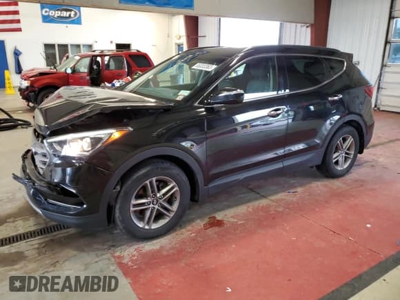 ✅ 2018 Hyundai Santa Fe 2.4L • VIN: 5XYZUDLB6JG535216 • Лот: 65333363. Опубликован ранее на Copart с пробегом 49 825 миль. Бесплатный доступ к архиву аукционных продаж из США и подробный отчёт об истории автомобиля на DreamBid. Изображение 1.