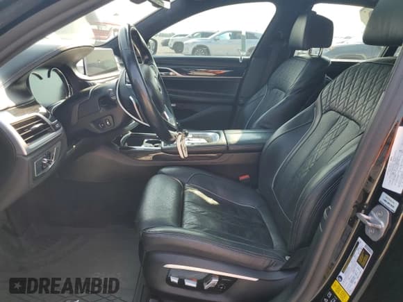 ✅ 2016 BMW 7 Series 750i xDrive • VIN: WBA7B0C59GGF92290 • Lot: 67015855. Wystawiony na Copart z przebiegiem 74 376 mil. Bezpłatny archiwum sprzedaży aukcyjnych z USA i szczegółowy raport historii pojazdu na DreamBid. Zdjęcie 7.