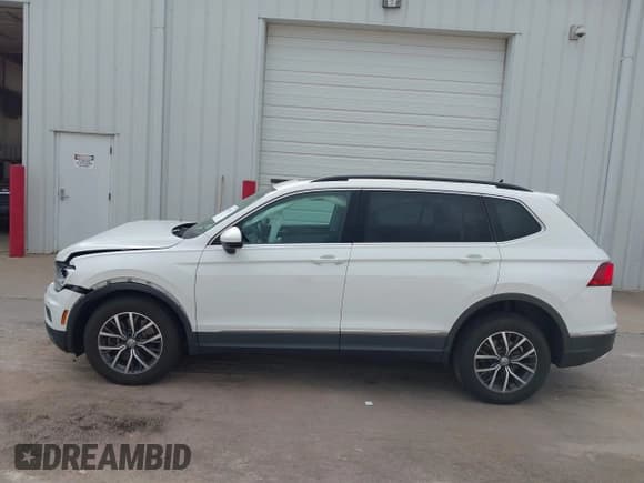 ✅ 2020 Volkswagen Tiguan SE • VIN: 3VV2B7AX2LM006165 • Lot: 43451353. Wystawiony na IAAI z przebiegiem 99 099 mil. Bezpłatny archiwum sprzedaży aukcyjnych z USA i szczegółowy raport historii pojazdu na DreamBid. Zdjęcie 14.