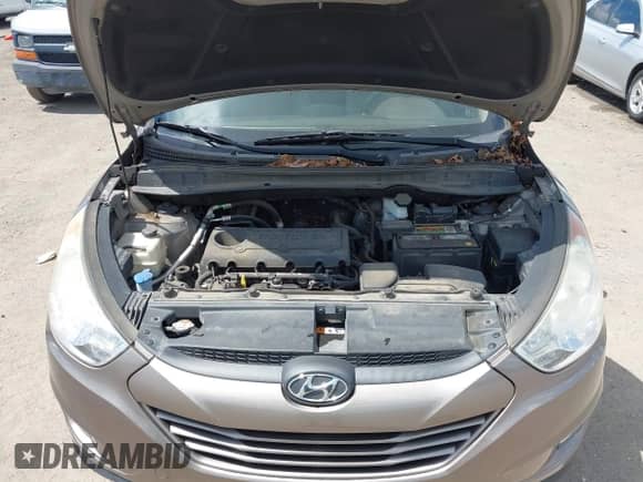 2013 Hyundai Tucson GLS z VIN KM8JU3AC5DU624633, wystawiony jako IAAI lot #42366217 z przebiegiem 108 258 mil mil oraz . Historia ofert i sprzedaży dostępna na DreamBid. Obrazek 10.