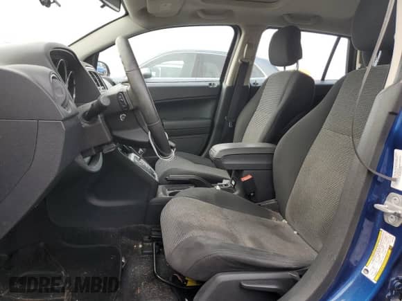 2010 Dodge Caliber SXT with VIN 1B3CB4HA7AD541392, listed as a Copart auction lot 57816044 with 90,996 mi miles and Salvage title. Bid and sale history available at DreamBid. Image 7.