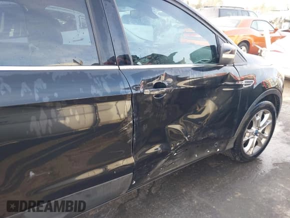 ✅ 2013 Ford Escape SEL • VIN: 1FMCU0HX1DUB02999 • Lot: 43671551. Listed on IAAI with 210,997 mi. Free auction sales archive from the USA and detailed vehicle history report at DreamBid. Image 6.