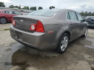 ✅ 2012 Chevrolet Malibu 1LS • VIN: 1G1ZB5E02CF152427 • Lot: 71737594. Listed on Copart with Not provided. Free auction sales archive from the USA and detailed vehicle history report at DreamBid. Image 3.