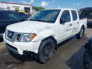 ✅ 2021 Nissan Frontier SV • VIN: 1N6ED0EA2MN705285 • Lot: 43180960. Listed on IAAI with 35,576 mi. Free auction sales archive from the USA and detailed vehicle history report at DreamBid. Image 2.