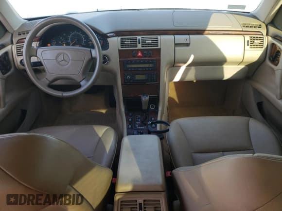 ✅ 1999 Mercedes-Benz E 320 • VIN: WDBJF65H9XA874886 • Lot: 82583865. Listed on Copart with 158,804 mi. Free auction sales archive from the USA and detailed vehicle history report at DreamBid. Image 8.