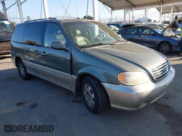 ✅ 2003 Kia Sedona LX • VIN: KNDUP131336372523 • Lot: 43528599. Listed on IAAI with 102,148 mi. Free auction sales archive from the USA and detailed vehicle history report at DreamBid. Image 1.