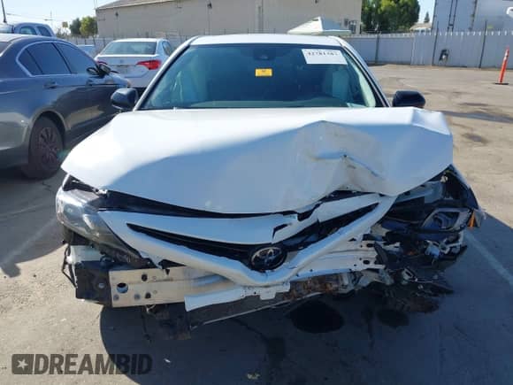 2022 Toyota Camry SE z VIN 4T1T11AK9NU076179, wystawiony jako IAAI lot #42781387 z przebiegiem 64 450 mil mil oraz . Historia ofert i sprzedaży dostępna na DreamBid. Obrazek 12.