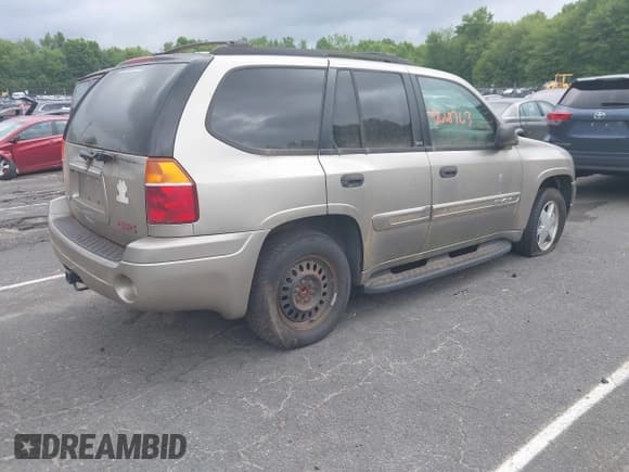 ✅ 2002 GMC Envoy SLT • VIN: 1GKDT13S022283765 • Lot: 42668763. Wystawiony na IAAI z przebiegiem 198 711 mil. Bezpłatny archiwum sprzedaży aukcyjnych z USA i szczegółowy raport historii pojazdu na DreamBid. Zdjęcie 4.