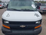 ✅ 2014 Chevrolet Express Passenger LS • VIN: 1GAZGZFGXE1112875 • Lot: 43821369. Listed on IAAI with 162,209 mi. Free auction sales archive from the USA and detailed vehicle history report at DreamBid. Image 17.