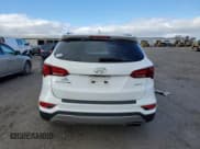 ✅ 2017 Hyundai Santa Fe 2.4L • VIN: 5NMZU3LBXHH019189 • Lot: 70523522. Listed on Copart with 84,038 mi. Free auction sales archive from the USA and detailed vehicle history report at DreamBid. Image 6.