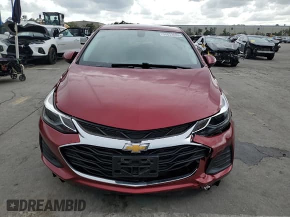 ✅ 2019 Chevrolet Cruze LT • VIN: 3G1BE6SM9KS601831 • Lot: 56832693. Listed on Copart with 55,257 mi. Free auction sales archive from the USA and detailed vehicle history report at DreamBid. Image 5.