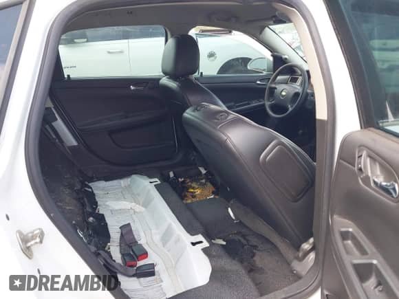 2014 Chevrolet Impala Police Police z VIN 2G1WD5E30E1114342, wystawiony jako IAAI lot #42388443 z przebiegiem 119 929 mil mil oraz . Historia ofert i sprzedaży dostępna na DreamBid. Obrazek 8.