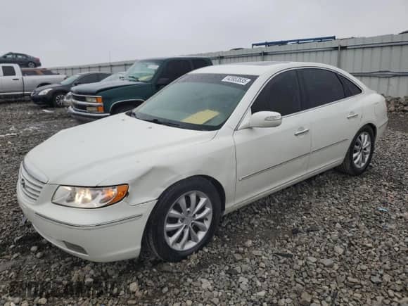 2007 Hyundai Azera SE z VIN KMHFC46F47A171001, wystawiony jako Copart lot #43953835 z przebiegiem 217 443 mil mil oraz Szkoda całkowita • Salvage title. Historia ofert i sprzedaży dostępna na DreamBid. Obrazek 1.