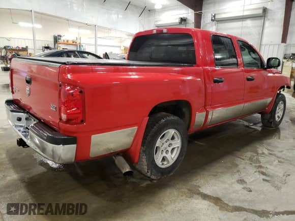 2006 Dodge Dakota SLT с VIN 1D7HW48N76S589897, выставлен на аукционе Copart как лот 80532214 с пробегом 139 395 миль миль и Списание • Salvage title. История ставок и продаж доступна на DreamBid. Изображение 3.