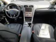 ✅ 2017 Ford Fusion Titanium • VIN: 3FA6P0K95HR139060 • Lot: 62200755. Listed on Copart with 106,133 mi. Free auction sales archive from the USA and detailed vehicle history report at DreamBid. Image 8.