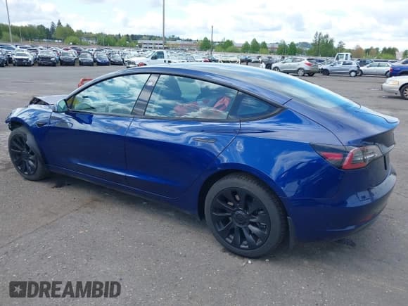 ✅ 2021 Tesla Model 3 Standard Range Plus • VIN: 5YJ3E1EA1MF094693 • Lot: 42083700. Wystawiony na IAAI z przebiegiem 79 222 mil. Bezpłatny archiwum sprzedaży aukcyjnych z USA i szczegółowy raport historii pojazdu na DreamBid. Zdjęcie 3.