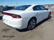✅ 2015 Dodge Charger SXT • VIN: 2C3CDXHG8FH824400 • Lot: 43550526. Listed on IAAI with 115,887 mi. Free auction sales archive from the USA and detailed vehicle history report at DreamBid. Image 4.