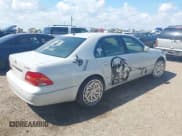 ✅ 2003 Lexus LS 430 • VIN: JTHBN30F930119233 • Lot: 43167036. Listed on IAAI with 145,370 mi. Free auction sales archive from the USA and detailed vehicle history report at DreamBid. Image 4.